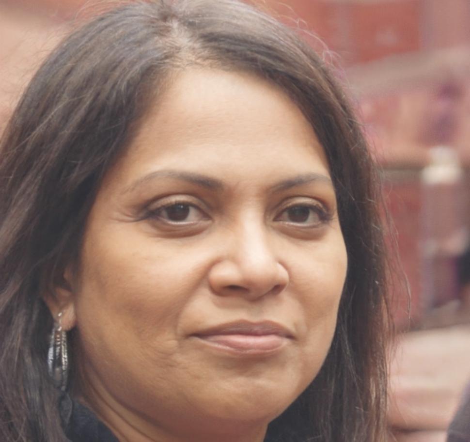 International student working on coding project in collaborative learning environment